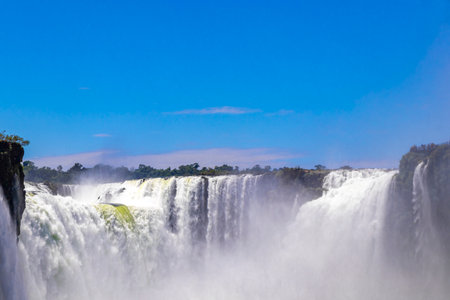 Foz do Iguacu Iguazu Falls waterfall fall waterfalls cascade cascades in tropical nature rainforest...