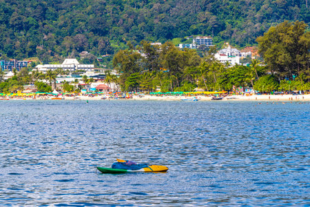Patong Phuket Thailand October 13, 2025 Canoe canoes kayak kayaks boat boats on the beach with sand and turquoise blue water in Patong Beach Kathu District Phuket Island Province Southern Thailand.のeditorial素材