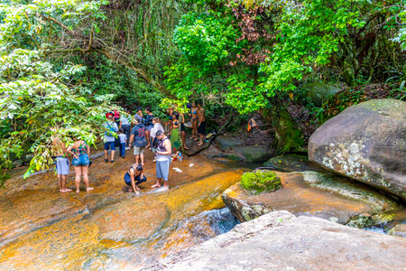 Ilha Grande Rio de Janeiro Brazil November 21, 2020 Cachoeira da Feiticeira waterfall waterfalls in the tropical rainforest jungle with people person tourists tourist on Ilha Grande Big Island Brazil.のeditorial素材
