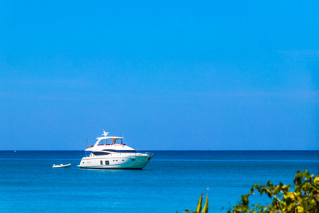 Sail sailing boat boats and yacht yachts in the sea at the Naiyang Beach coast seascape in Sirinat...