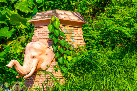 Kathu District Phuket Island Province Southern Thailand November 29, 2025 Novotel hotel resort with tropical plants palm trees elephant statues sculptures fountain and welcome entrance Patong Beach.のeditorial素材