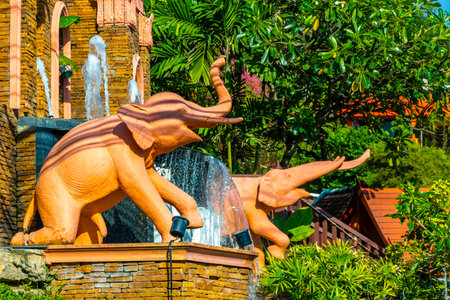 Kathu District Phuket Island Province Southern Thailand November 29, 2025 Novotel hotel resort with tropical plants palm trees elephant statues sculptures fountain and welcome entrance Patong Beach.のeditorial素材