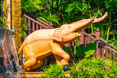 Kathu District Phuket Island Province Southern Thailand November 29, 2025 Novotel hotel resort with tropical plants palm trees elephant statues sculptures fountain and welcome entrance Patong Beach.のeditorial素材