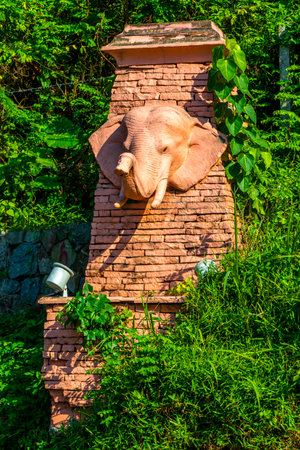 Kathu District Phuket Island Province Southern Thailand November 29, 2025 Novotel hotel resort with tropical plants palm trees elephant statues sculptures fountain and welcome entrance Patong Beach.のeditorial素材