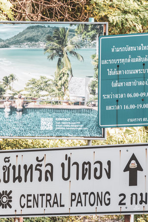 Kathu District Phuket Island Province Southern Thailand November 29, 2025 Novotel hotel resort with tropical plants palm trees fountain and welcome entrance road sign sign board signpost Patong Beach.のeditorial素材