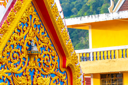 Kathu District Phuket Island Province Thailand December 27, 2025 Welcome gate door entrance to the Suwankeereewong Temple wat golden Buddhist temples in Patong Beach Phuket Island Southern Thailand.の写真素材