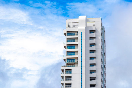 Kathu District Phuket Island Province Thailand October 10, 2025 Patong Tower white blue building hotel resort apartments complex with blue sky in Patong Beach Thailand in Southeast Asia.のeditorial素材