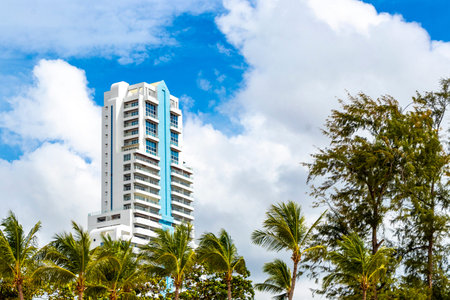 Kathu District Phuket Island Province Thailand October 8, 2025 Patong Tower white blue building hotel resort apartments complex with blue sky in Patong Beach Thailand in Southeast Asia.のeditorial素材