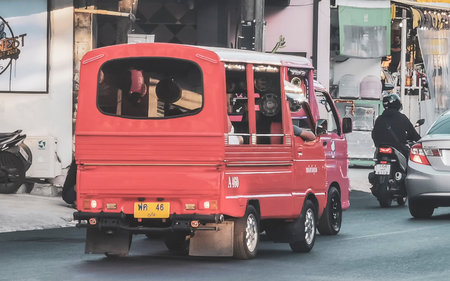 Kathu District Phuket Province Thailand January 17, 2026 Red Public transportation tuk tuk pick up truck car roofcar cab taxi in Patong Beach Kathu Phuket Island Southern Thailand in Southeast Asia.のeditorial素材