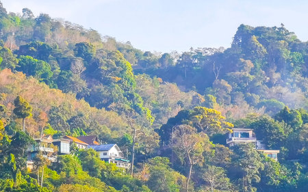 Panoramic view and panorama of tropical landscape mountains city and beach with blue sky in Patong Beach Kathu District Phuket Island Province Southern Thailand in Southeast Asia.の写真素材