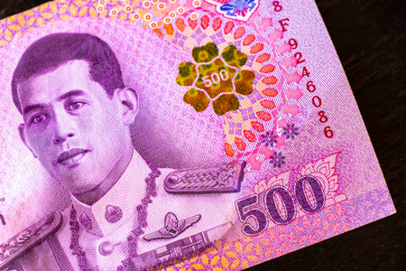 Kathu District Phuket Island Province Thailand February 06, 2026 Thai Baht cash money banknotes paper currency and coins on the table rich luxury life in Patong Beach Phuket Thailand in Southeast Asia.のeditorial素材