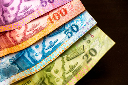 Kathu District Phuket Island Province Thailand February 11, 2026 Thai Baht cash money banknotes...