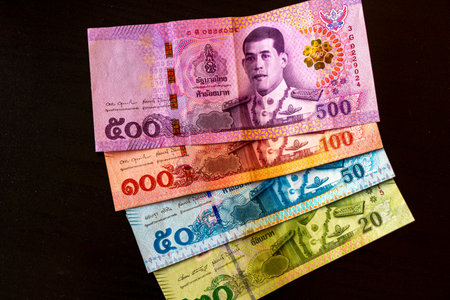 Kathu District Phuket Island Province Thailand February 11, 2026 Thai Baht cash money banknotes...