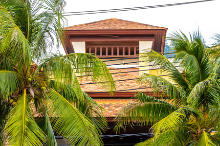 Kathu District Phuket Province Thailand 11. February 2026 Modern buildings architecture hotel hotels resort resorts apartments in tropical paradise palm trees rainforest nature Patong Beach Thailand.のeditorial素材