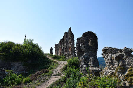 Ruin of old castle in Khust city. Landscape, Zakarpattia Oblast. Ukraine.の写真素材