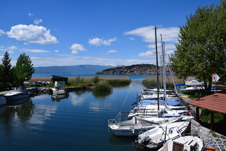 Ohrid, Macedonia - may 2017: Channel Studenchishta harbor. Boats port in Dutch Park. Ohrid Lake, Macedonia.のeditorial素材