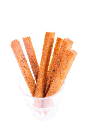 Fried bread in a glass on a white background. Toast, bread.の写真素材
