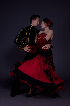 Studio shooting on a black background, the dancers in costume.の写真素材