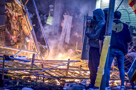 Riots between the Spanish police and the Catalan people in the Urquinaona square of Catalonia, in...