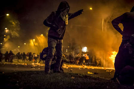 Riots between the Spanish police and the Catalan people in the Urquinaona square of Catalonia, in...