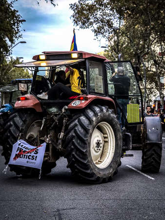 Different agrarian unions with their tractors marching in the demonstration that claims the right to...
