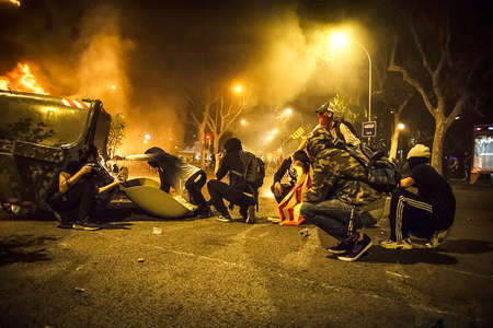 Riots between the Spanish police and the Catalan people in the Urquinaona square of Catalonia, in...