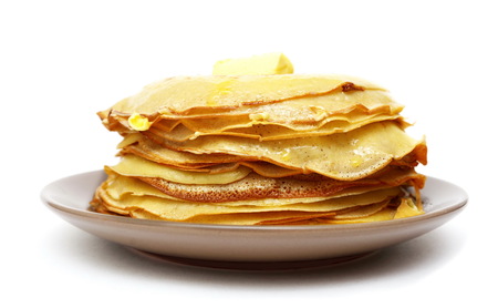 pancackes with butter on the plate closeup isolatedの写真素材