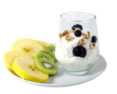 fresh yogurt with fruits and nuts isolated closeupの写真素材