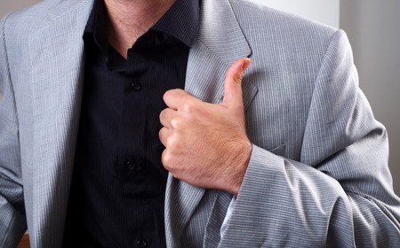 young man body language superior closeupの写真素材