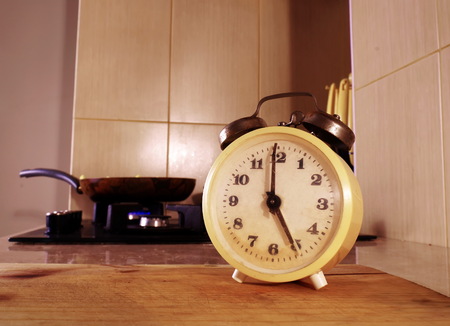 Old fashion clock shows dinner time