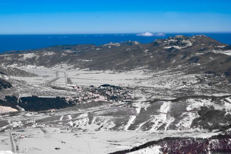 View of an apennine winter landscape from the top of a mountainの写真素材