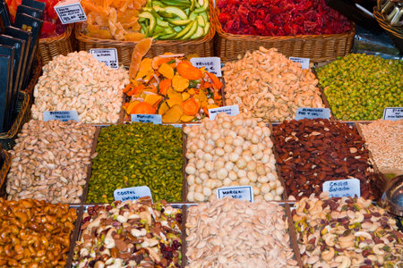 Baskets of dried fruit in a marketの写真素材