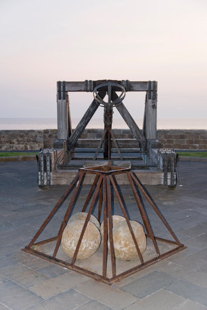 Catapult on the defense tower in a medieval village, Italy