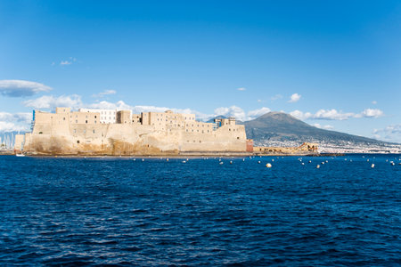 View of Egg Castle and Vesuvius in the background in the gulf of Naples, Italyの写真素材