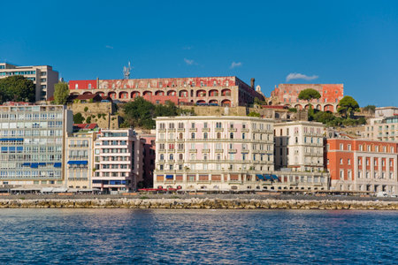 View from the sea of historic buildings on the Naples waterfront, Italyの写真素材