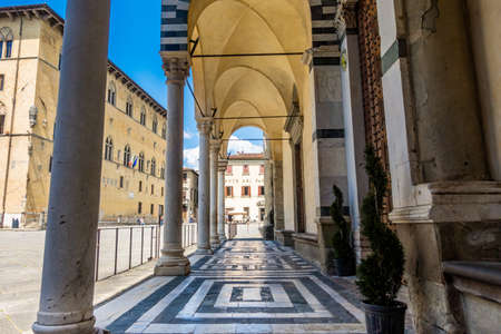 Pistoia, Tuscany, Italy - May 2020: Piazza Duomo, the setting (in July) of the Giostra dell'Orso (Bear Joust) with Cathedral of San Zeno, Palazzo del Comune, Palazzo del Podesta and baptisteryのeditorial素材