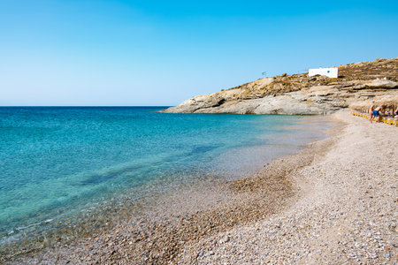 Lia Beach, wild and free beach in the south of Mykonos, Greece. Pristine bay with blue sea and crystal water, famous for naturism and Scuba diving school, peaceful and quiet.の写真素材