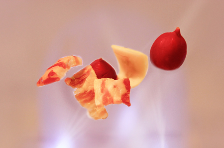 radish, cheese and meat on abstract backgroundの写真素材