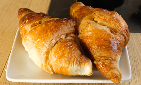 Italian brioches on white plate, Brioche In Italian Bakeryの写真素材