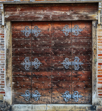 antique doors with forged locks, Venice; Italyの写真素材