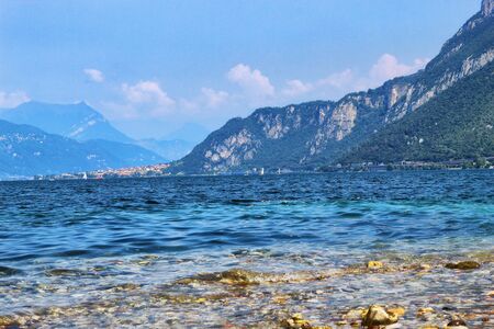 Lake Como with yachts. A sailing boats on beautiful lake Como, Italyの写真素材