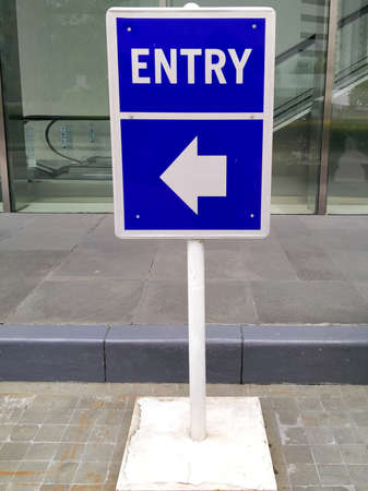 WTC II, Sudirman, Jakarta, Indonesia - April 28, 2020 : A blue sign that is used as a signpost to enterのeditorial素材