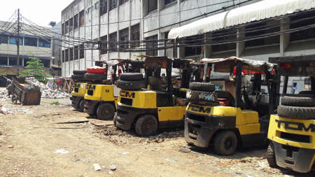 Wisma Aldiron, West Jakarta, Indonesia - February 25, 2019 : A collection of old forklifts that are...