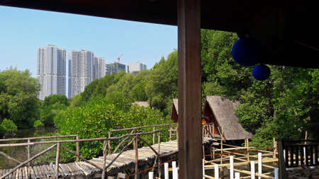 Mangrove forest, Jakarta, Indonesia - September 23, 2018 : Lodging in the tourist area of ââmangrove forest in the form of a traditional cottageのeditorial素材