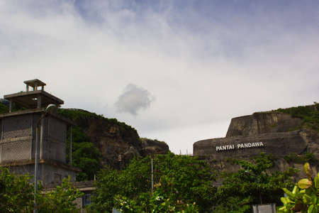 Pantai Pandawa, Bali, Indonesia - December 1, 2018 : A view of the hill from a distance with the sign "Pantai Pandawa" writtenのeditorial素材