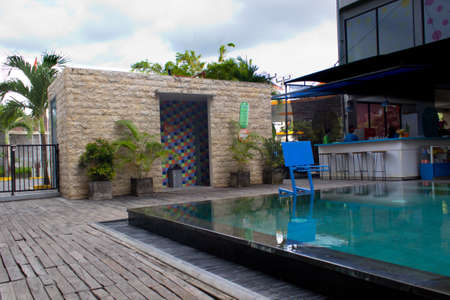 Pop hotel, Kuta, Bali - December 1, 2020 : In the afternoon, there is a swimming pool and a building where you can change clothesのeditorial素材