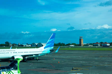 Bandar udara Ngurah Rai, Bali, Indonesia - December 4, 2018 : The atmosphere of the airport was seen by airplanes that were parkedのeditorial素材