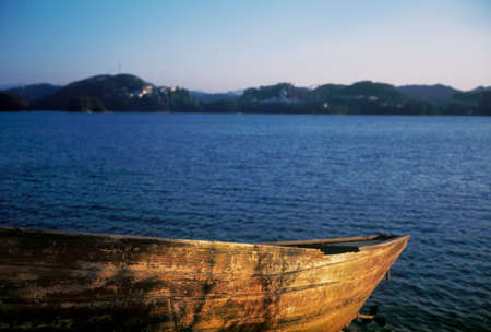 Wooden boat at Lakeの写真素材