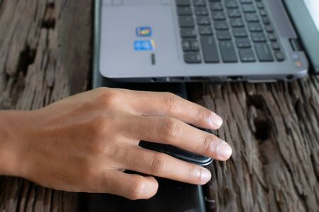 Man work on laptop outside the office.の写真素材