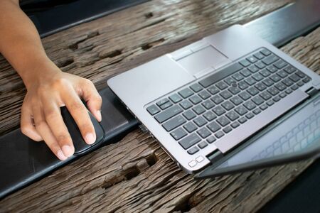 Man work on laptop outside the office.の写真素材